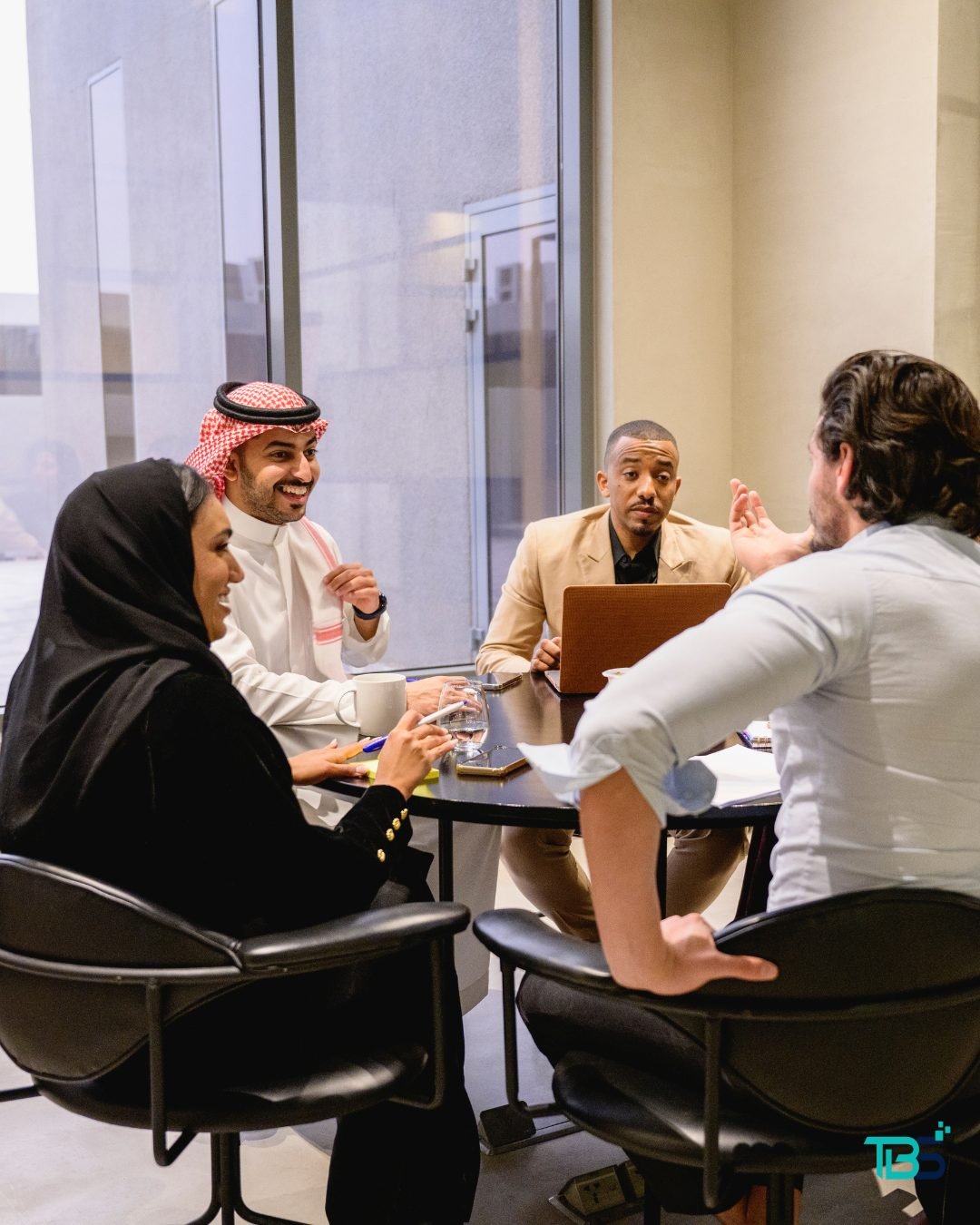 Tanaghum team meeting with a client